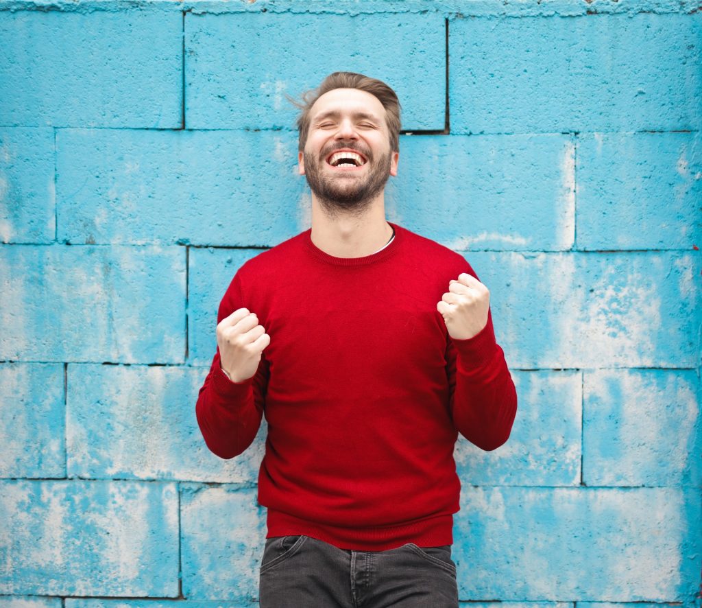 happy man fulfilled after plastic surgery